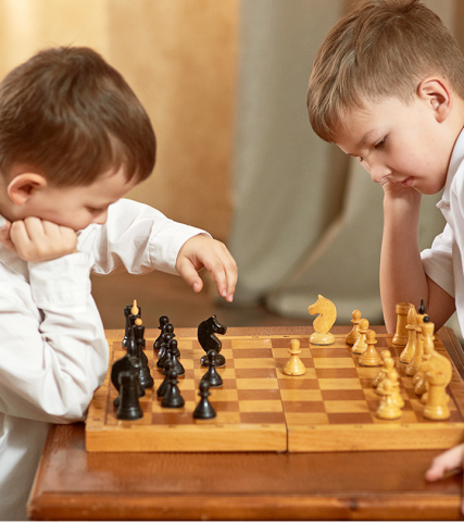 Small Boys Playing Chess