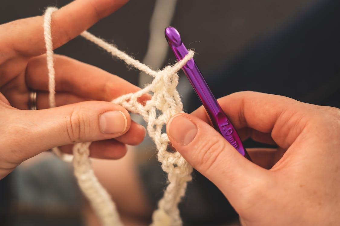 2 hands crocheting