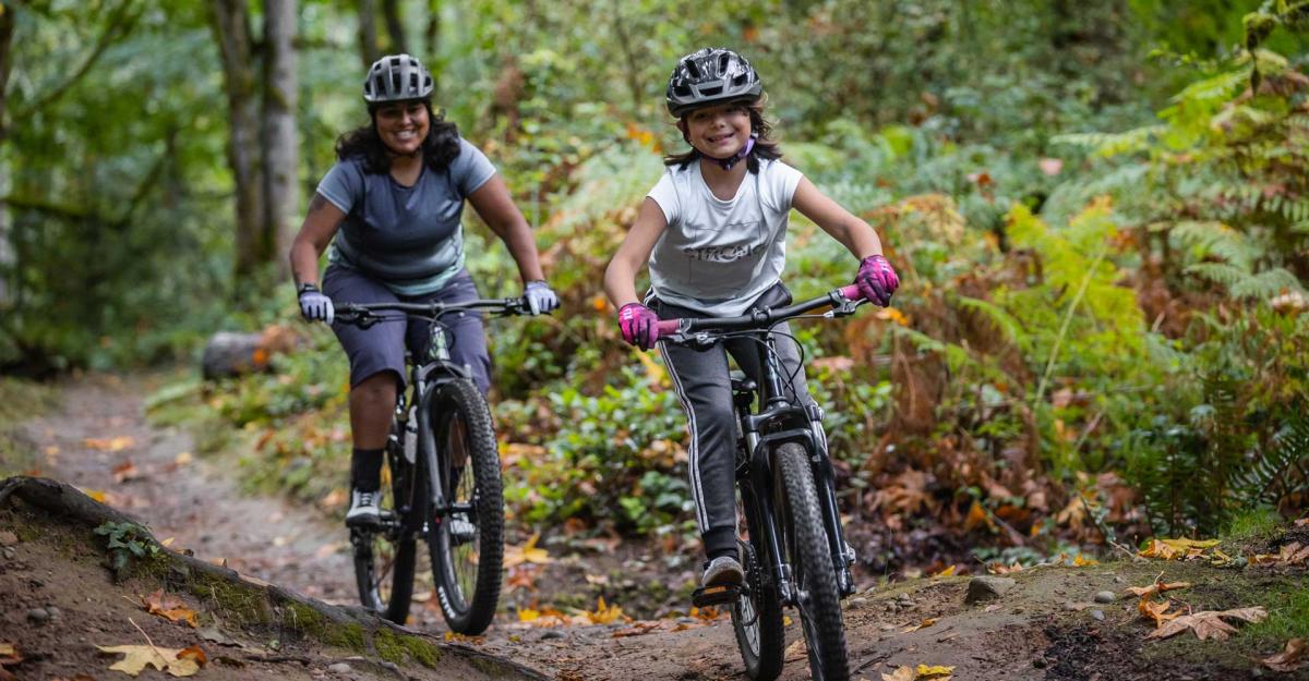 adult and child riding bikes 